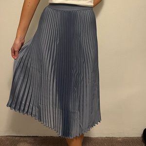silky blue pleated skirt